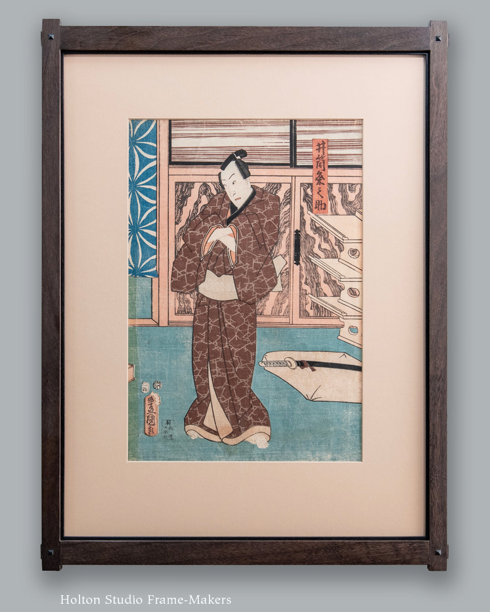 Man in Brown Kimono Standing in a Room